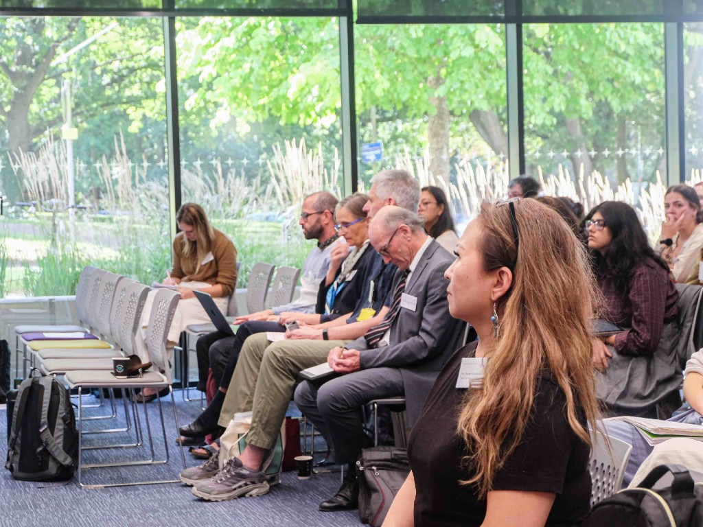 Conference audience listening to a breakout session at the Critical Decade for Climate Action Conference in September 2025, held at the University of East Anglia (UEA) by the Tyndall Centre for Climate Change Research