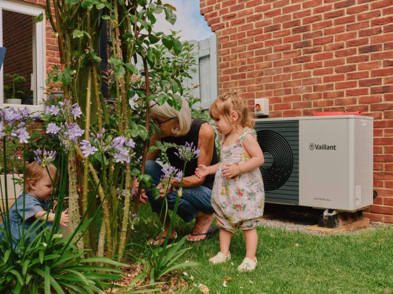 Playing in the garden near a heat pump in Somerset, England, in June 2025.